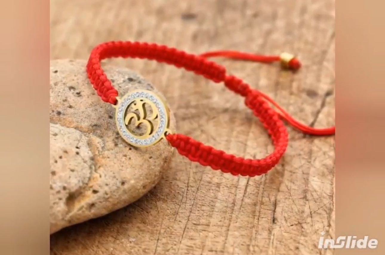 Bracelet corde rouge avec symbole OM